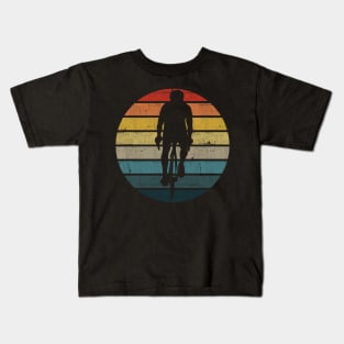 Bicyclist Silhouette On A Distressed Retro Sunset product Kids T-Shirt